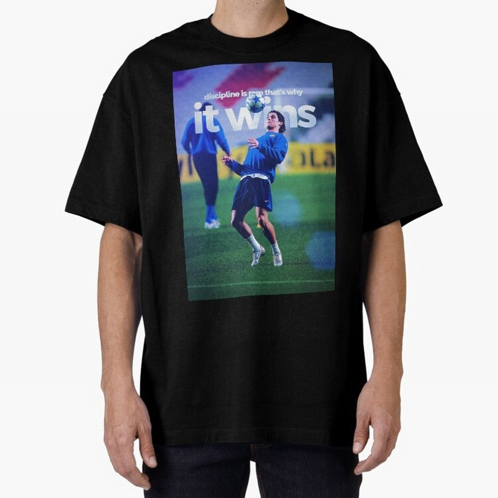 Cristiano Ronaldo - Discipline is rare that's why it wins Oversized T-Shirt Feel International Energy from FIFA World Cup 2026 USA Canada Mexico Spirit, Capturing Argentina and Brazil, Messi, Championship Spirit, Famous Goals, Roaring Crowds and
