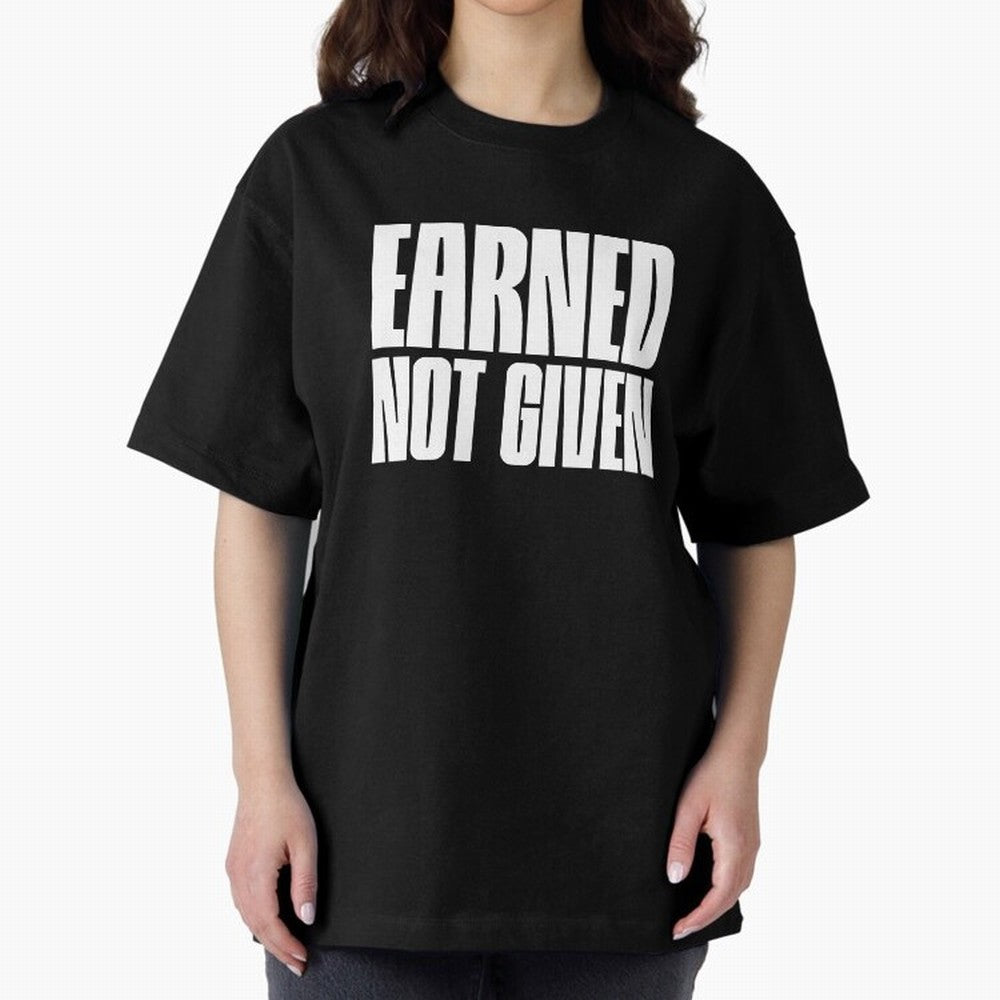 Earned not given white Oversized T-Shirt Showcase FIFA World Cup 2026 Centered on Cristiano Ronaldo, Argentina and Brazil Energy, Classic Soccer Heritage, Championship Pressure, Fan Loyalty and International Pride; Perfect for People Who Love
